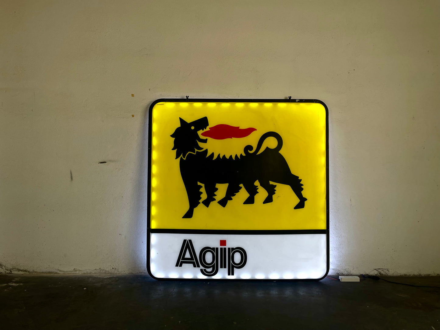 Insegna luminosa Agip